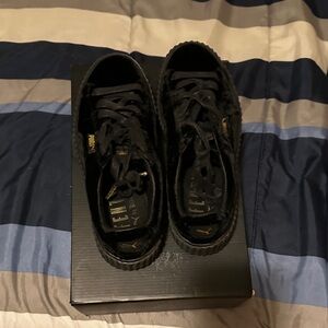Puma Black and Gold Athletic Shoes